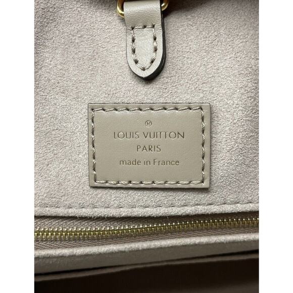 Louis Vuitton OnTheGo Tote MM Gray Turtle dove Empreinte Leather - Picture 12 of 13